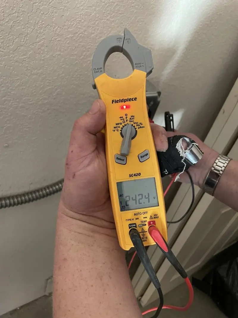 Voltage testing with clamp meter during Generator Installation in Roosevelt